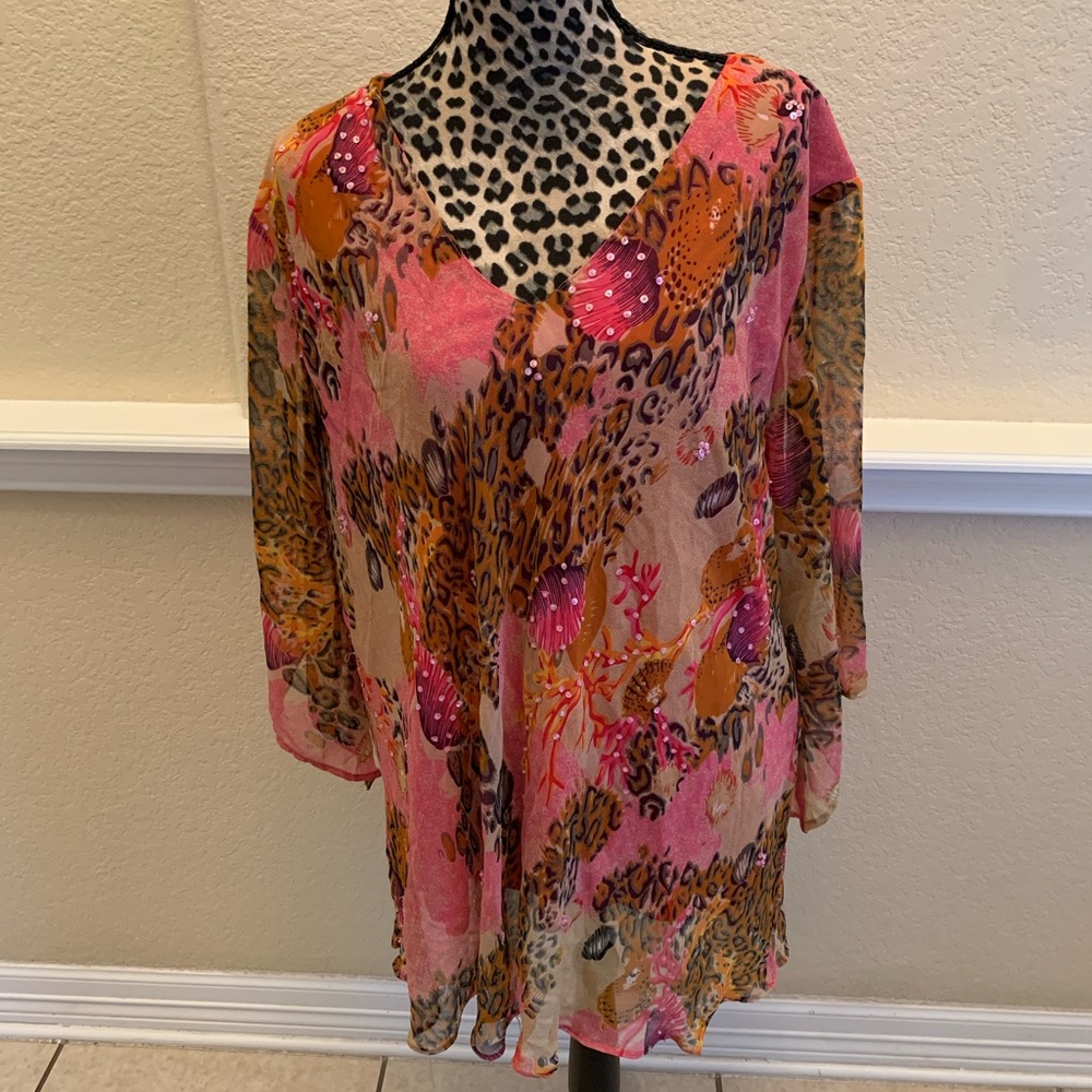 Dressy Leopard Pink sheer lined blouse.
